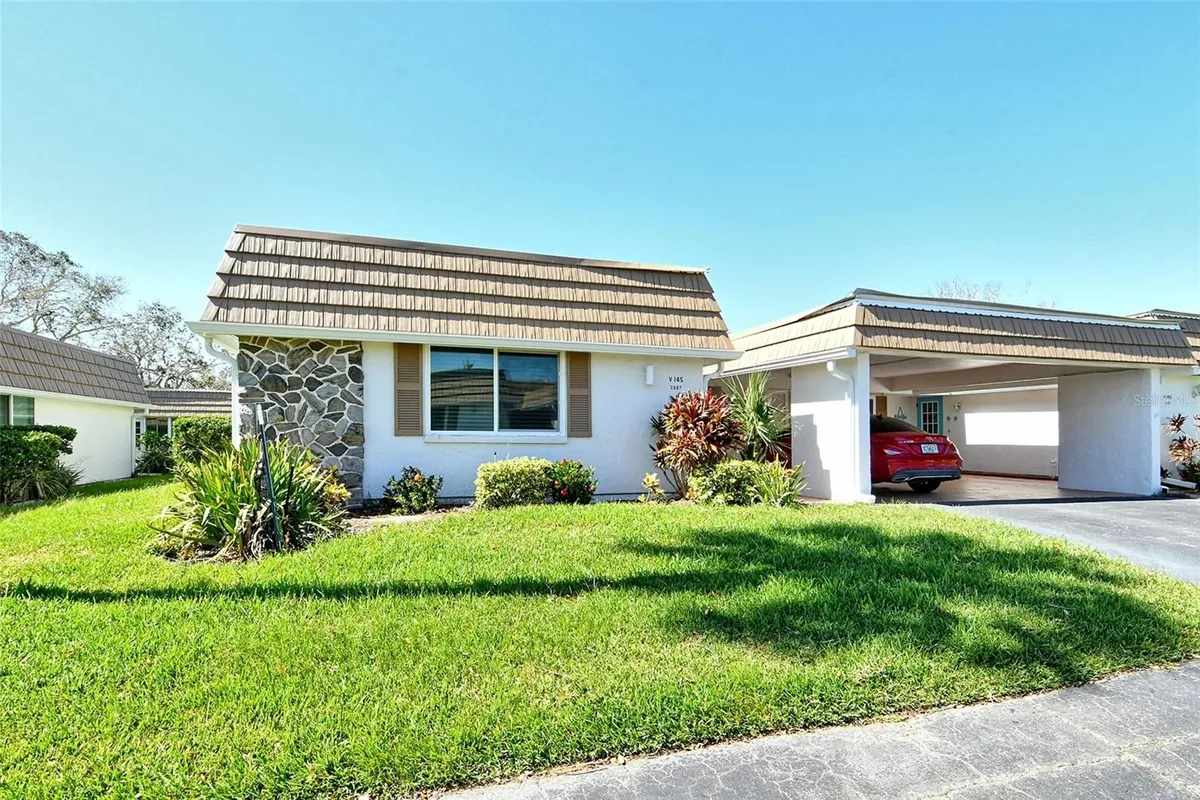 Property Slideshow image 1 of 59 | 2607 riverbluff pkwy v145, Sarasota, FL, 34231
