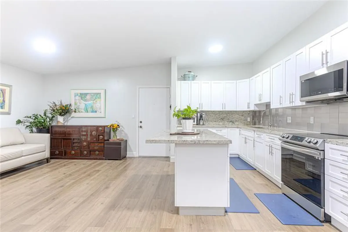 Property Slideshow image 1 of 25 | 10675 w clairmont cir # 202, Tamarac, FL, 33321