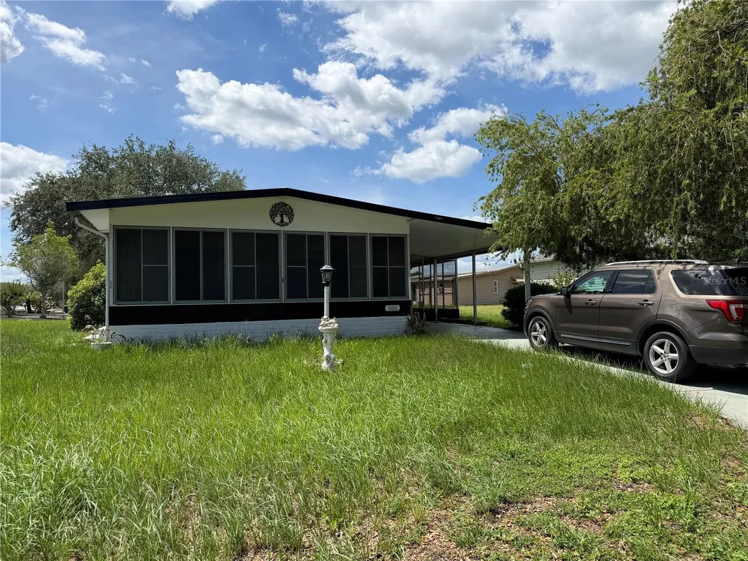 Property Slideshow image 1 of 26 | 925 beechwood ave, The Villages, FL, 32159