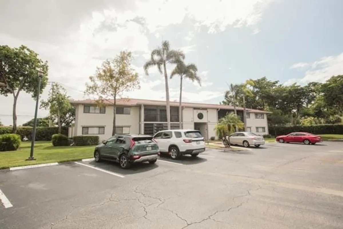 Property Slideshow image 1 of 14 | 10753 w clairmont cir 106, Tamarac, FL, 33321