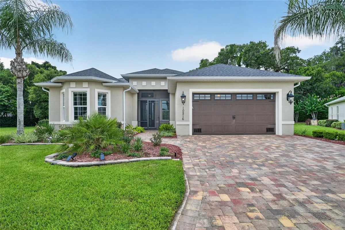 Property Slideshow image 1 of 56 | 10216 julia isles ave, Oxford, FL, 34484