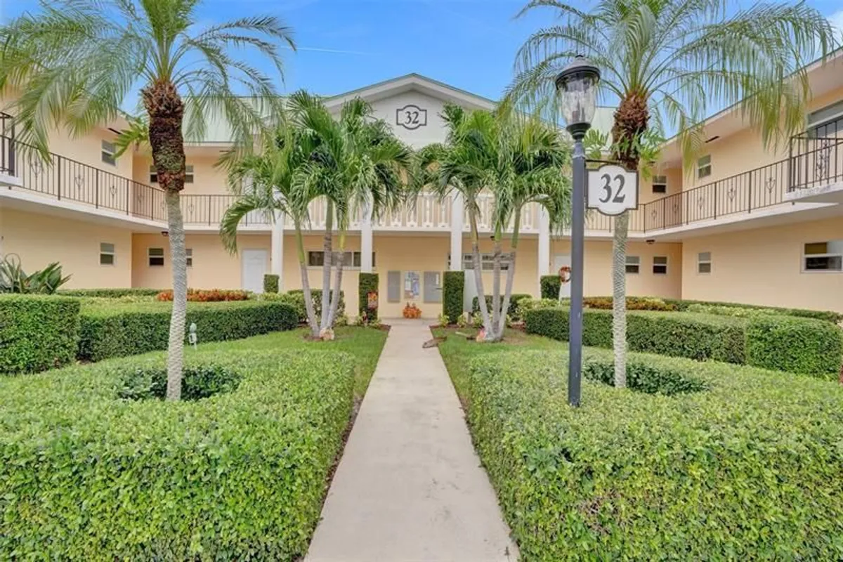 Property Slideshow image 1 of 38 | 32 colonial club dr apt 202, Boynton Beach, FL, 33435