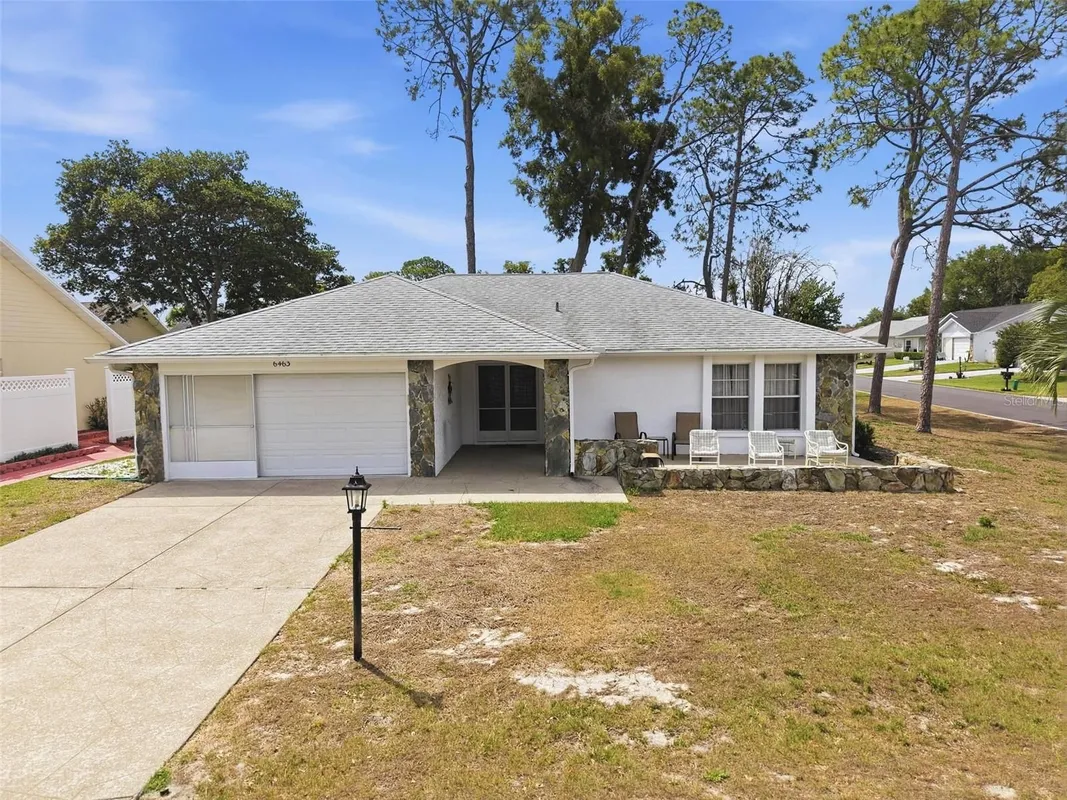 Property Slideshow image 1 of 70 | 6463 putters cir, Spring Hill, FL, 34606