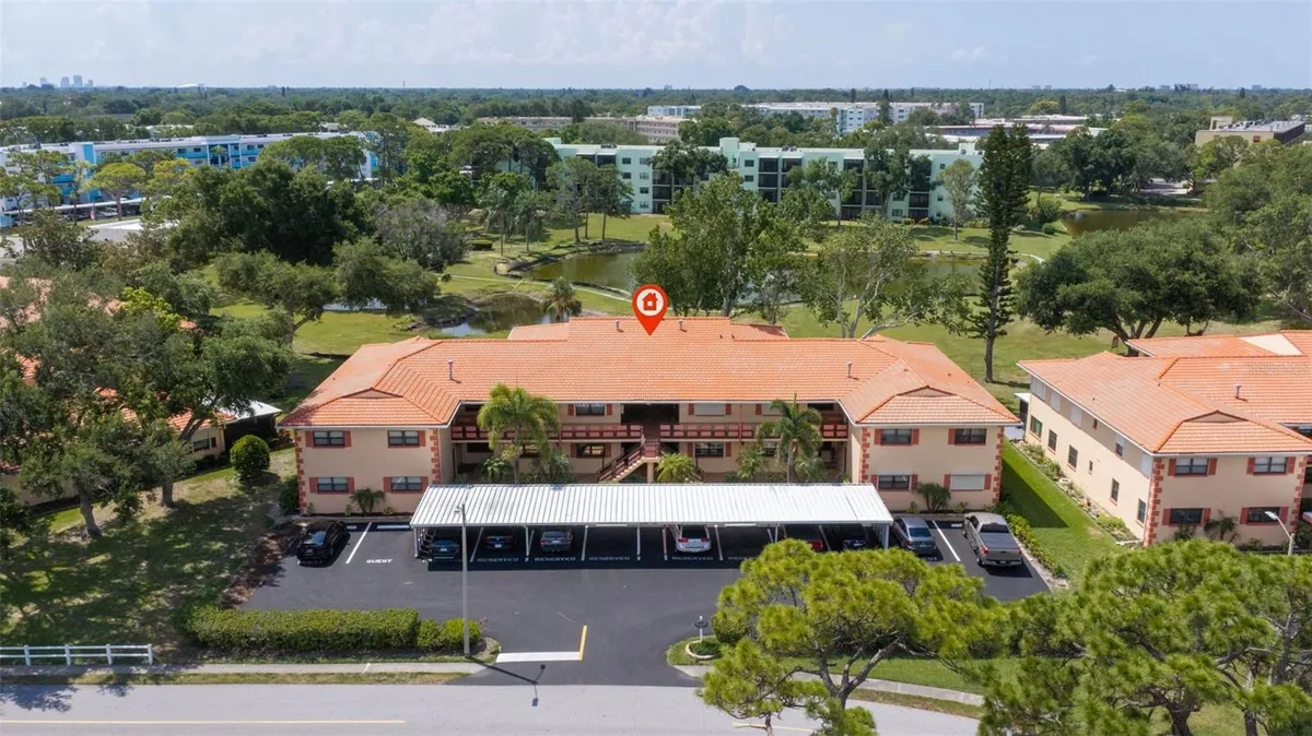 Property Slideshow image 1 of 59 | 8140 terrace garden dr 103, St Petersburg, FL, 33709