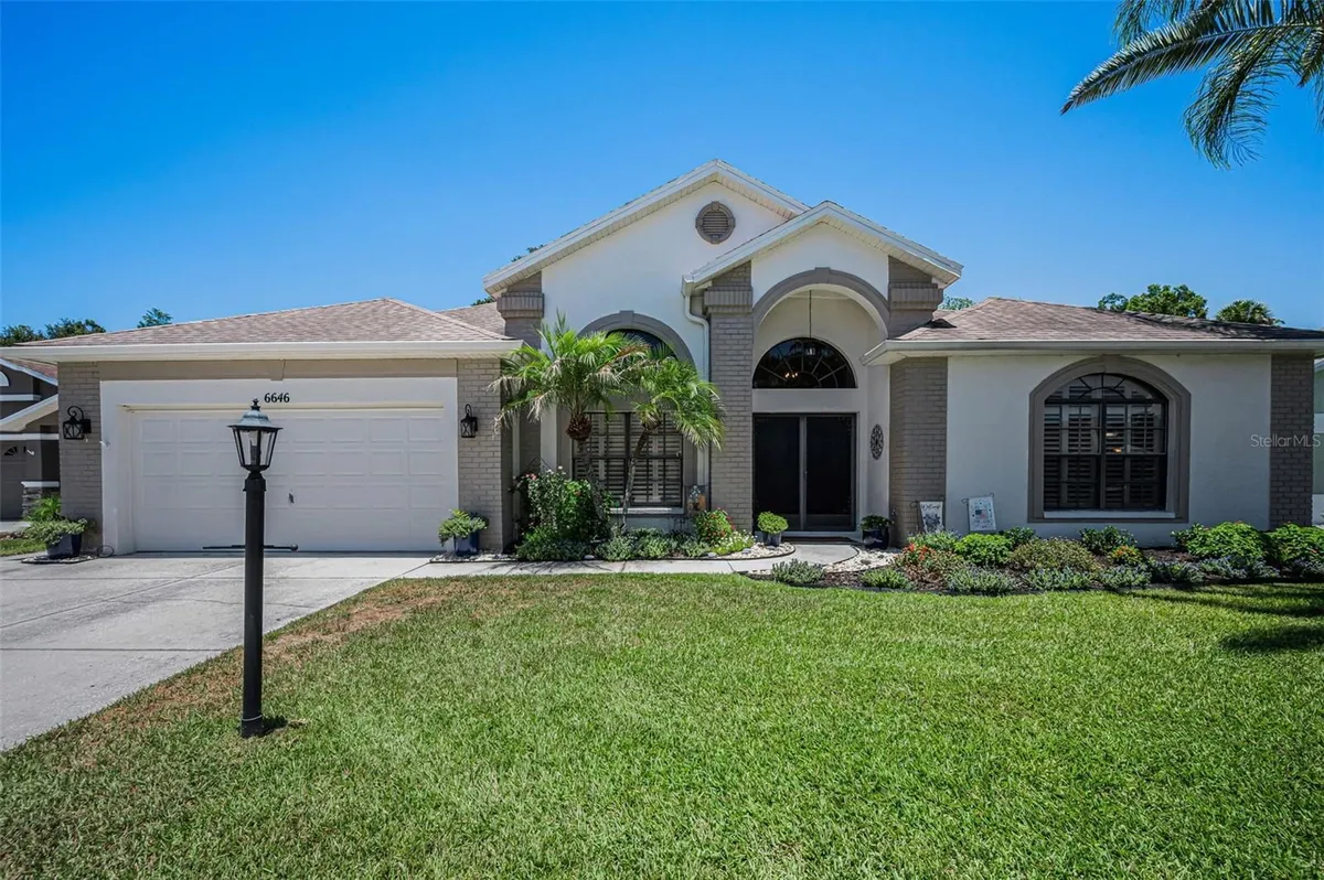 Property Slideshow image 1 of 79 | 6646 garden palm ct, New Port Richey, FL, 34655