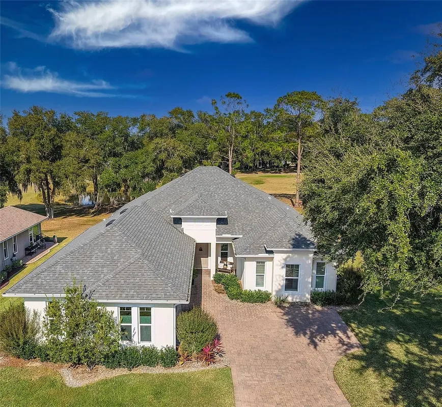 Property Slideshow image 1 of 67 | 5090 greens dr, Lady Lake, FL, 32159