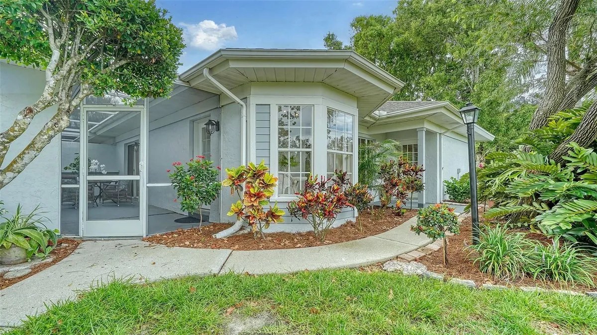 Property Slideshow image 1 of 47 | 6467 carrington cir 43, Sarasota, FL, 34238