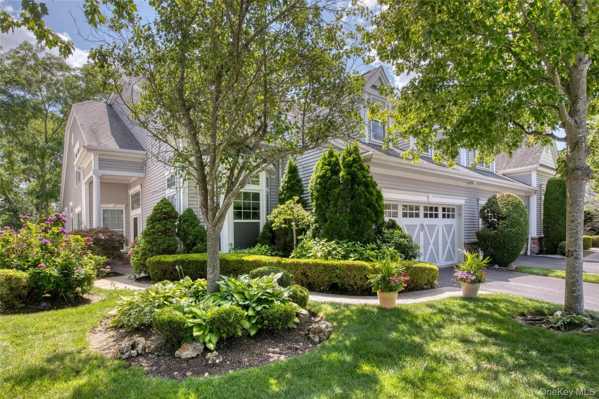 Property Slideshow image 1 of 26 | 63 encore blvd, Brookhaven, NY, 11941