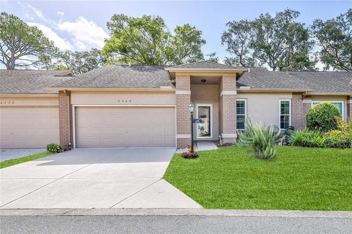 Property Slideshow image 1 of 56 | 2468 whispering pines ct, Spring Hill, FL, 34606