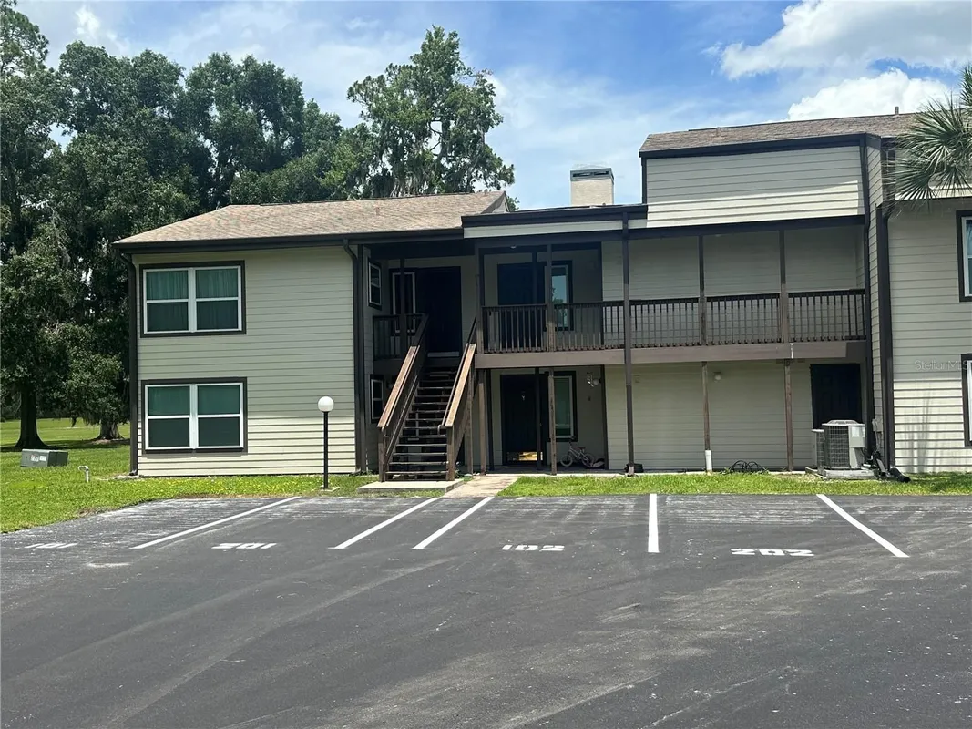 Property Slideshow image 1 of 15 | 17202 sandalwood dr 202, Wildwood, FL, 34785