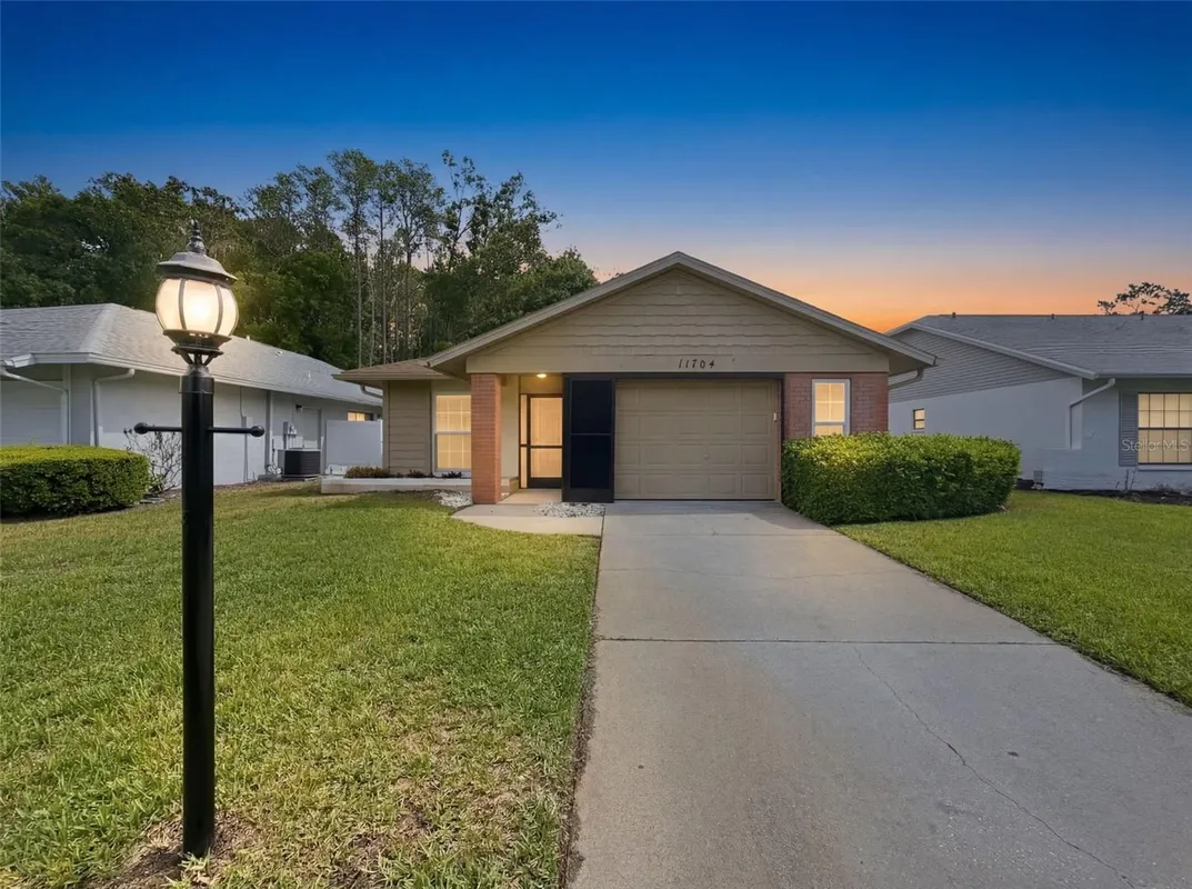 Property Slideshow image 1 of 57 | 11704 aspenwood dr, New Port Richey, FL, 34654