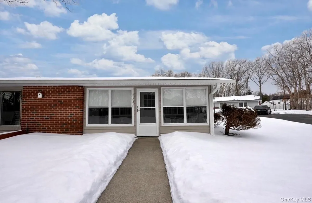 Property Slideshow image 1 of 12 | 258 newcastle ct f, Ridge, NY, 11961