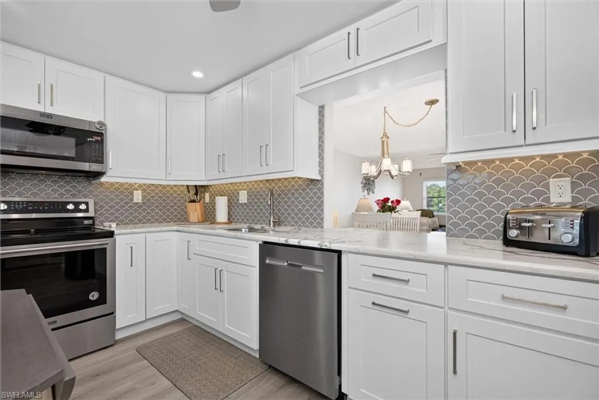 Property Slideshow image 1 of 50 | 1740 pine valley dr 203, Fort Myers, FL, 33907