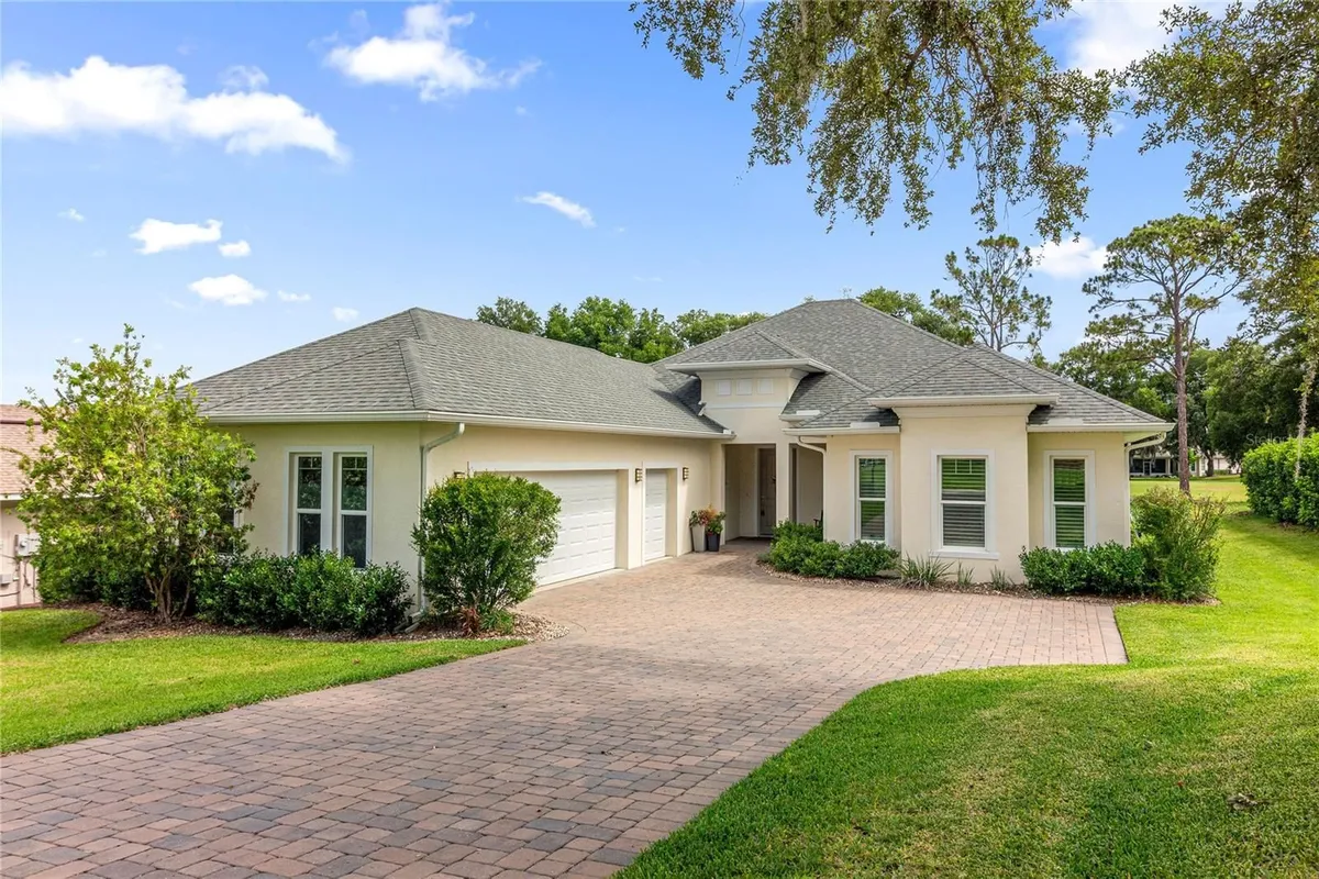 Property Slideshow image 1 of 49 | 5090 greens dr, Lady Lake, FL, 32159