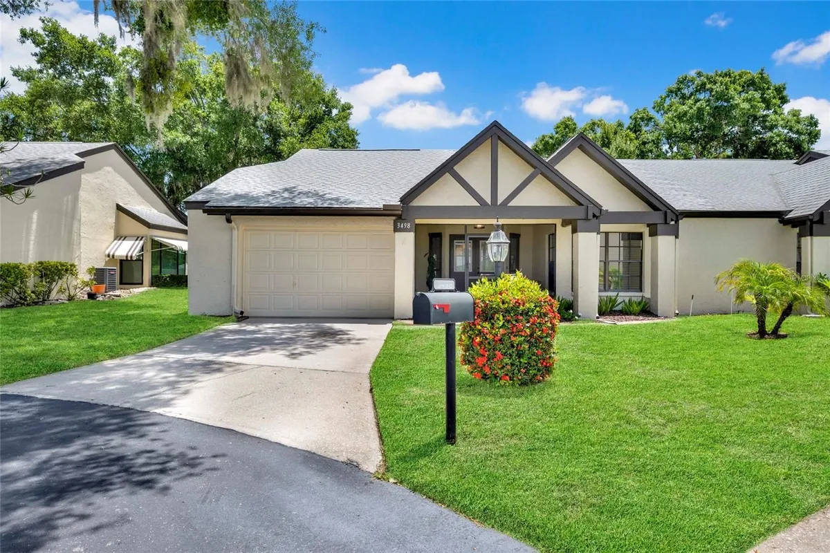 Property Slideshow image 1 of 61 | 3498 e woodmont way, Palm Harbor, FL, 34684