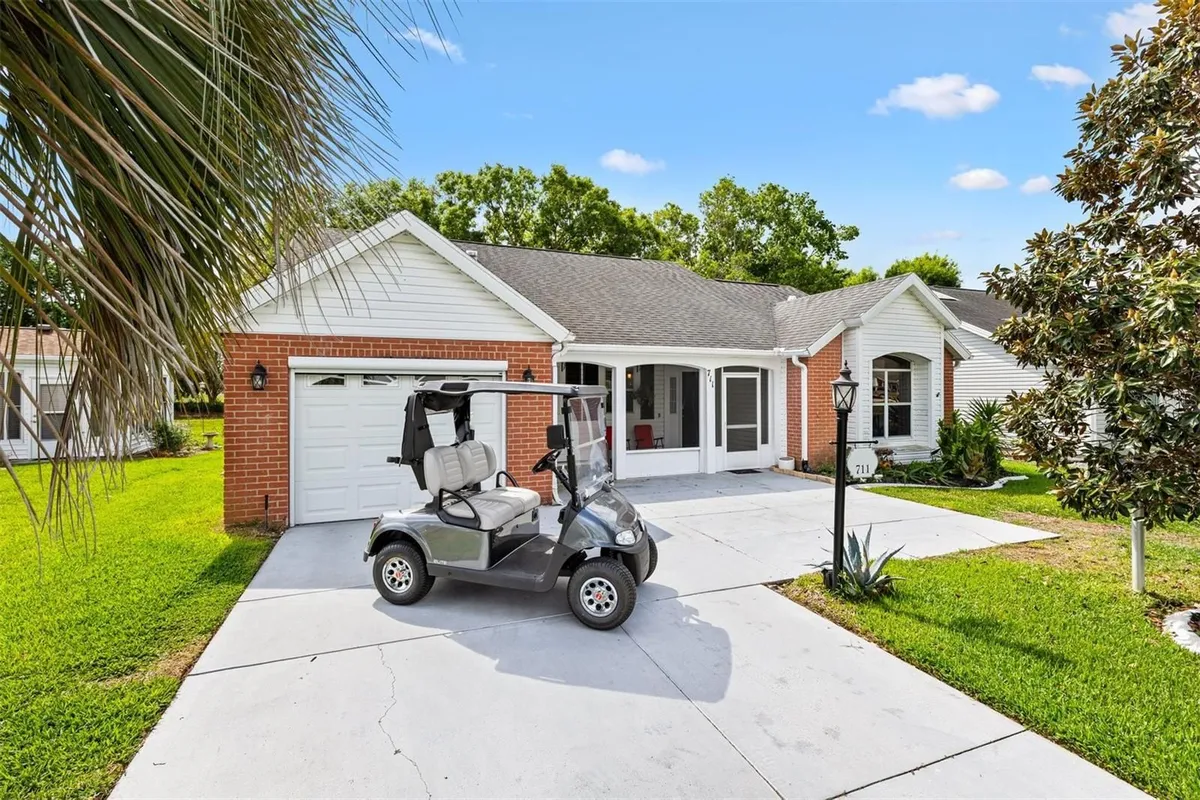 Property Slideshow image 1 of 16 | 711 agua way, Lady Lake, FL, 32159