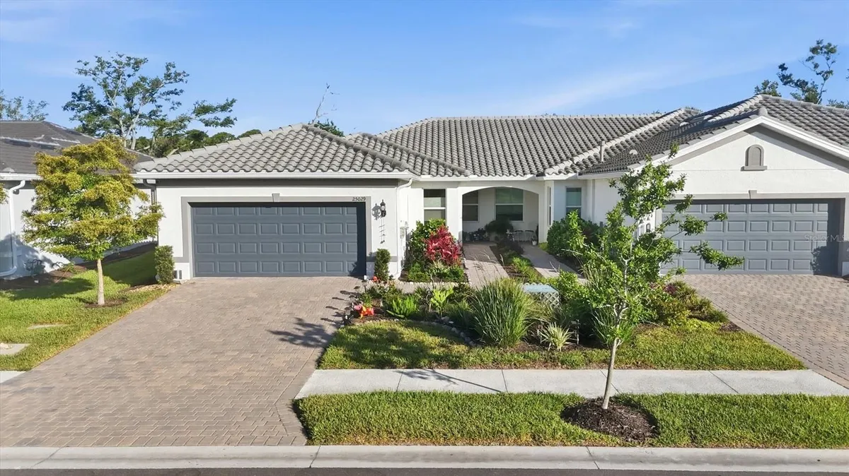 Property Slideshow image 1 of 70 | 25029 pearl lake cir, Englewood, FL, 34223