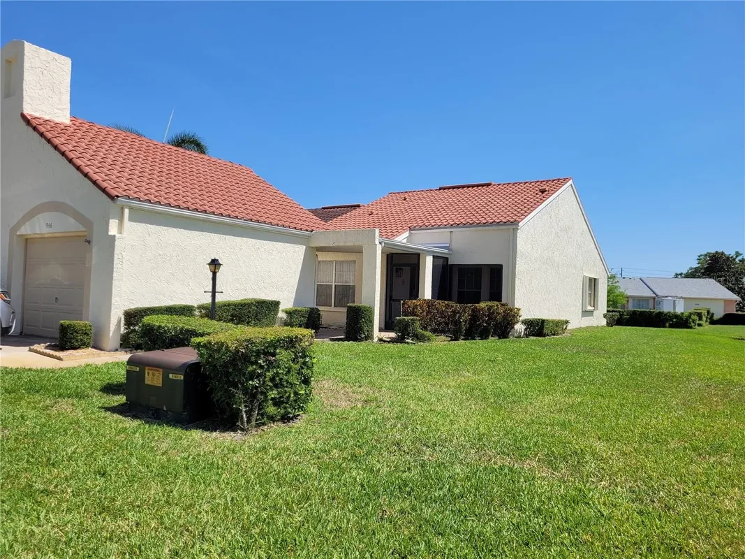 Property Slideshow image 1 of 23 | 946 madrid dr, Palm Harbor, FL, 34684