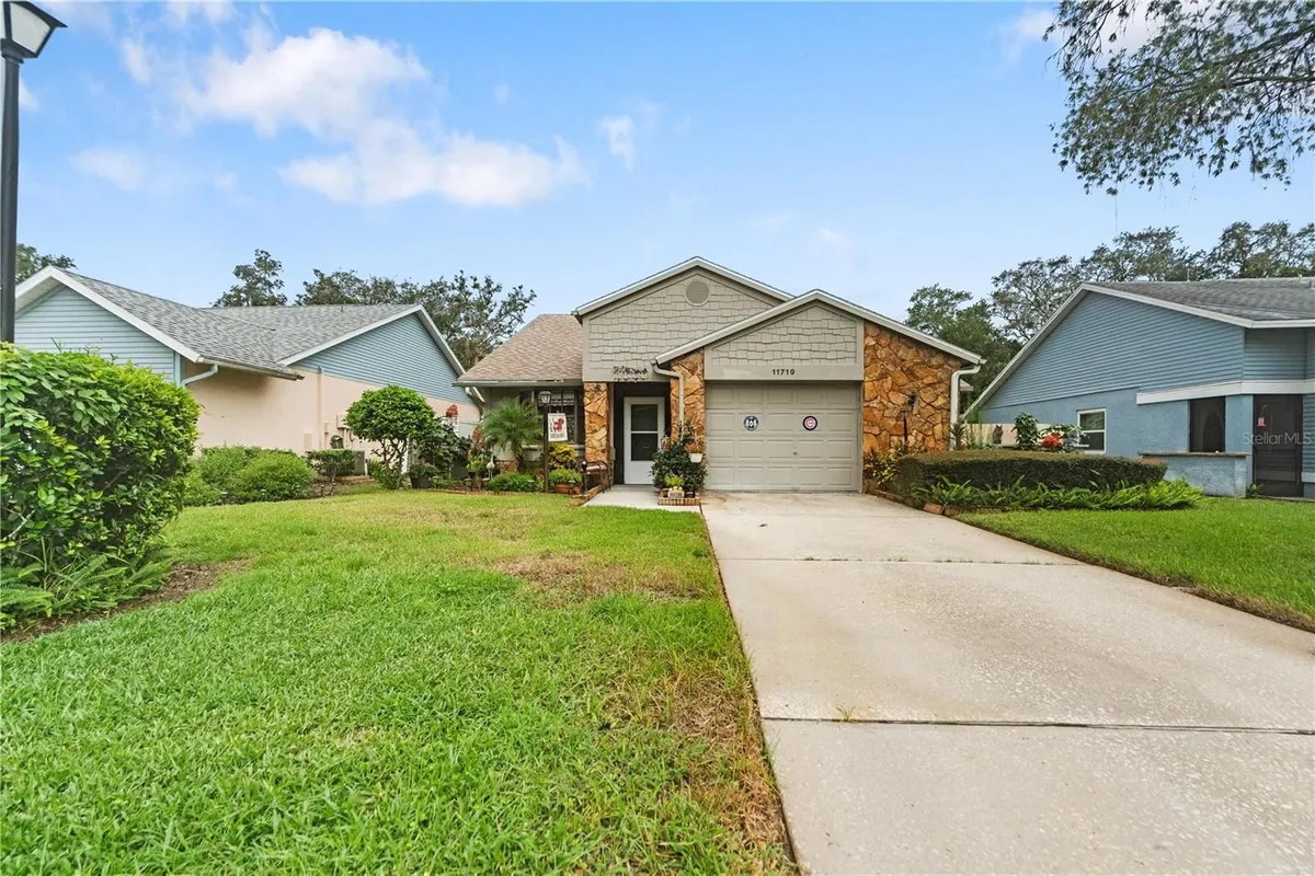 Property Slideshow image 1 of 51 | 11719 rose tree dr, New Port Richey, FL, 34654