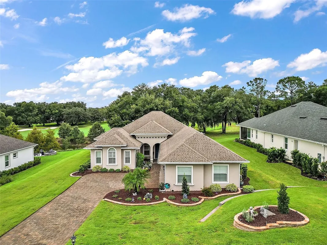 Property Slideshow image 1 of 47 | 5096 greens dr, Lady Lake, FL, 32159