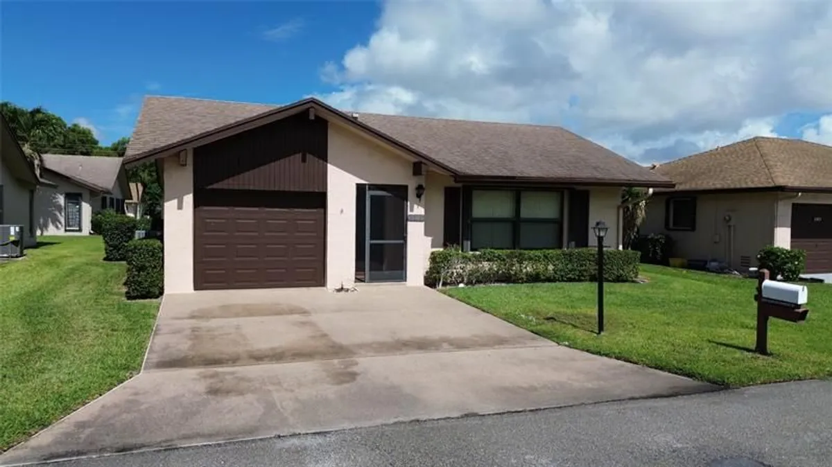 Property Slideshow image 1 of 30 | 3305 silver buttonwood dr, Greenacres, FL, 33463
