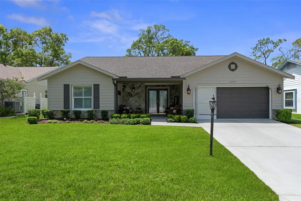 Property Slideshow image 1 of 82 | 6357 pine meadows dr, Spring Hill, FL, 34606