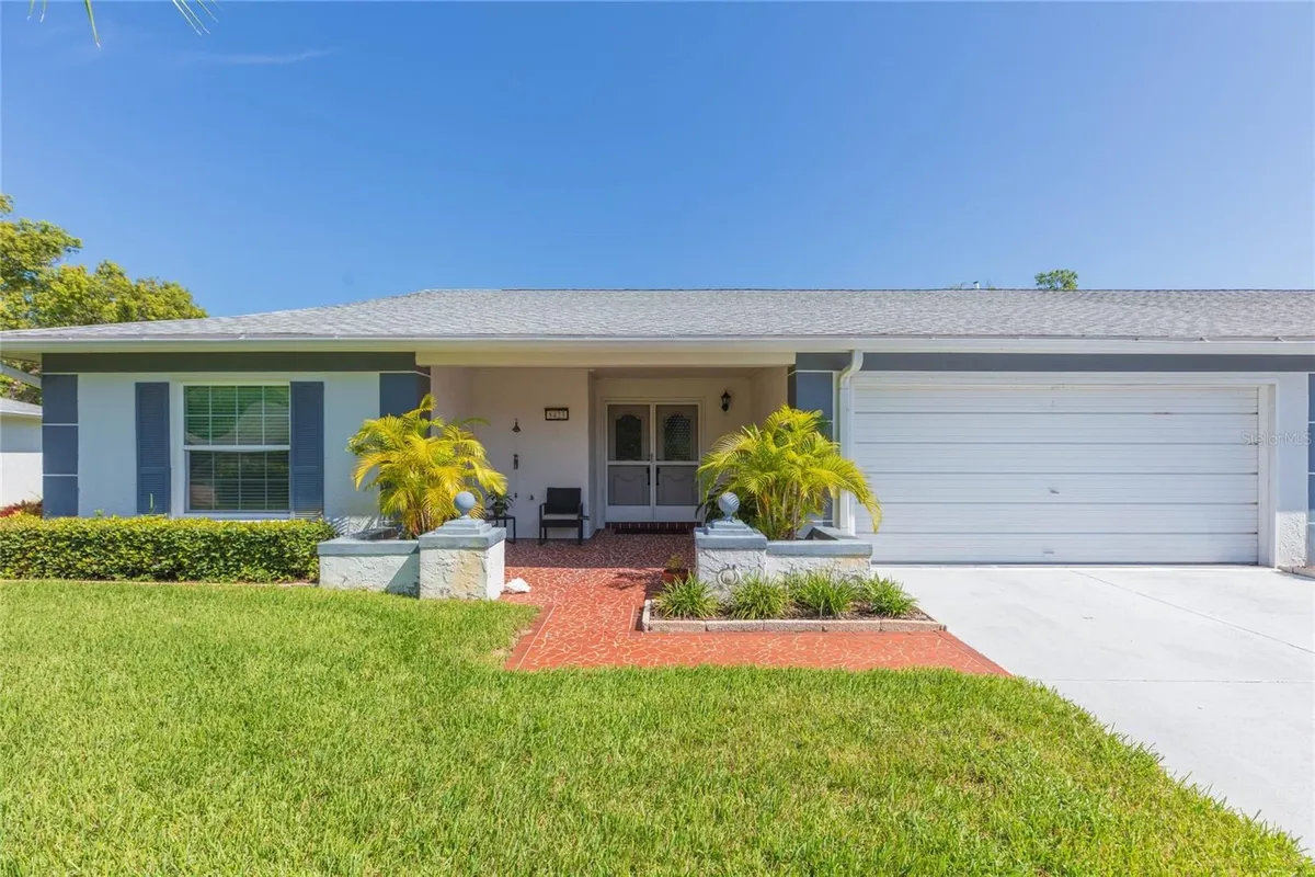 Property Slideshow image 1 of 40 | 8423 pebble dr, Port Richey, FL, 34668