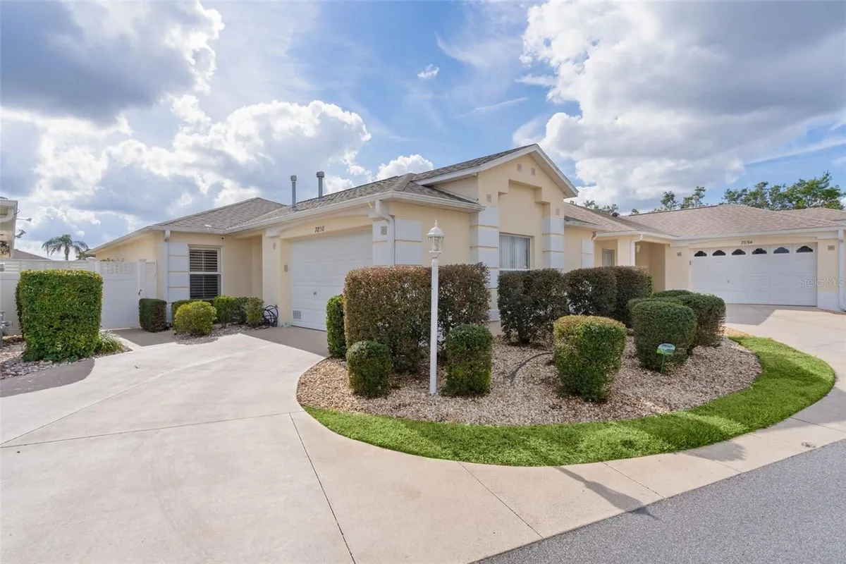 Property Slideshow image 1 of 40 | 7858 se 171st buchanan pl, The Villages, FL, 32162
