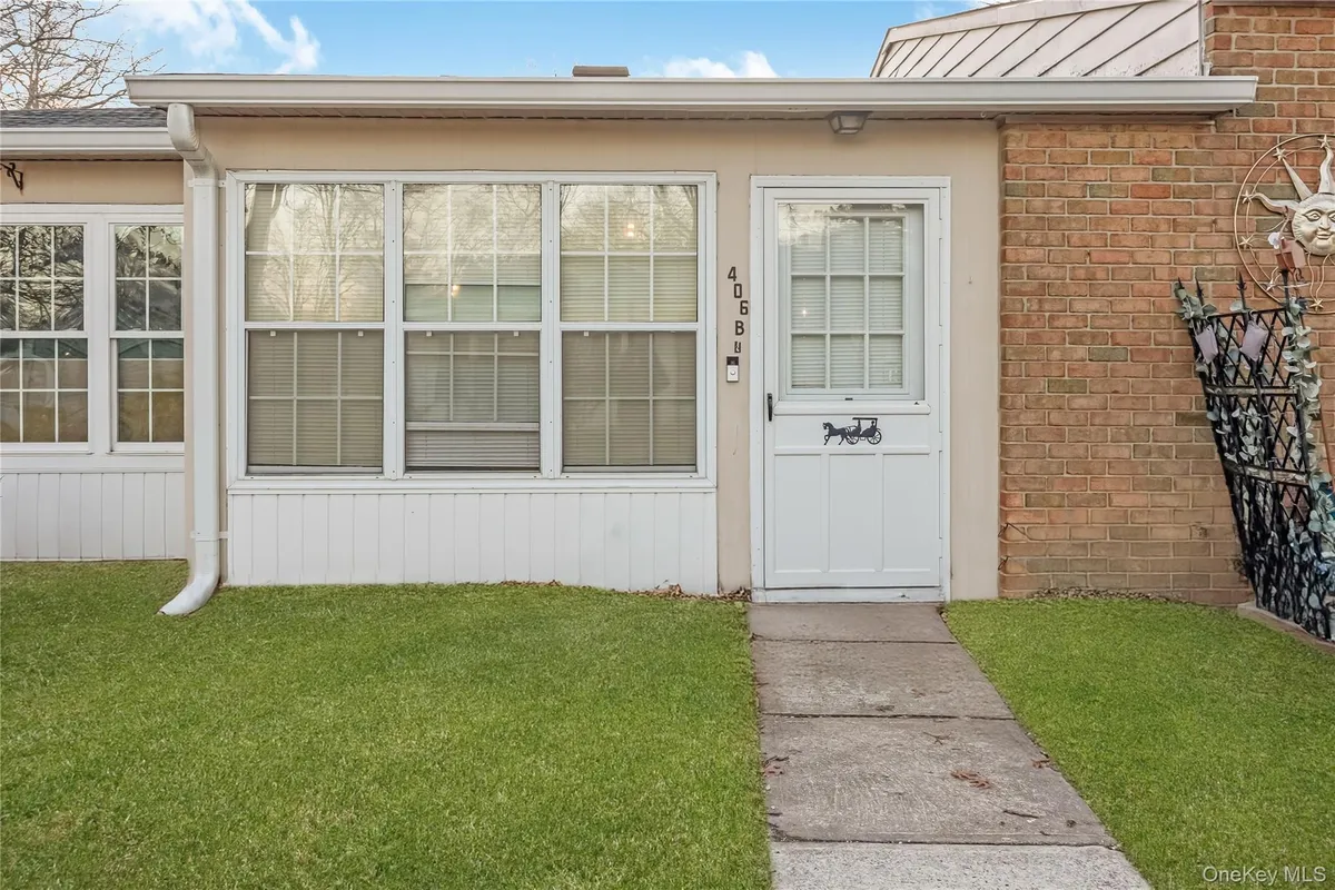 Property Slideshow image 1 of 15 | 406 woodbridge dr b, Ridge, NY, 11961