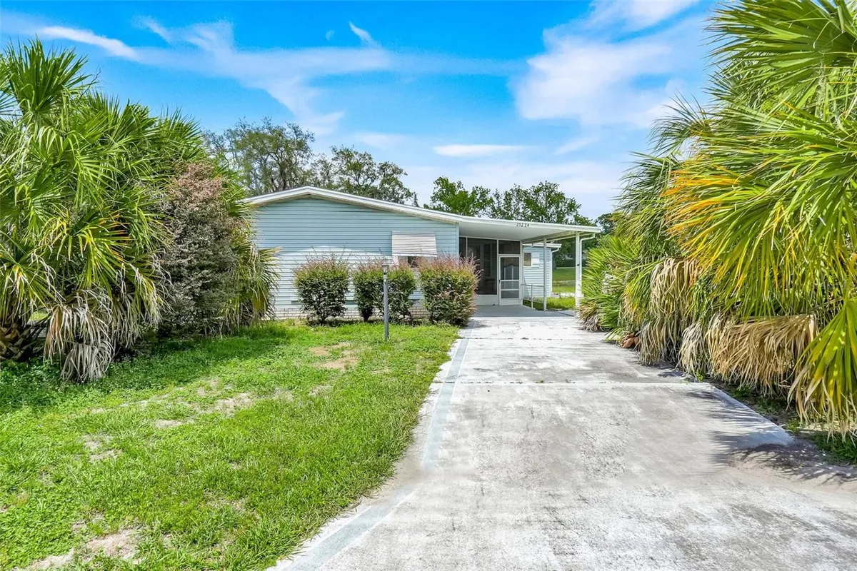 Property Slideshow image 1 of 26 | 25224 wild heron, Leesburg, FL, 34748