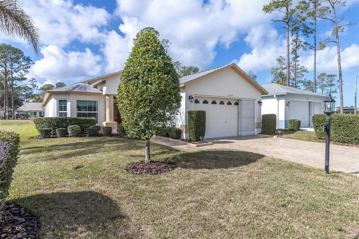 Property Slideshow image 1 of 38 | 11634 wheatfield loop, Hudson, FL, 34667