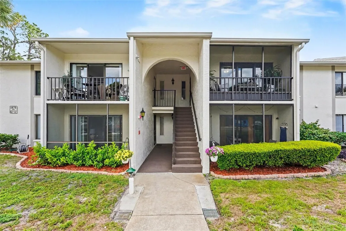 Property Slideshow image 1 of 29 | 1870 pine ridge way d2, Palm Harbor, FL, 34684