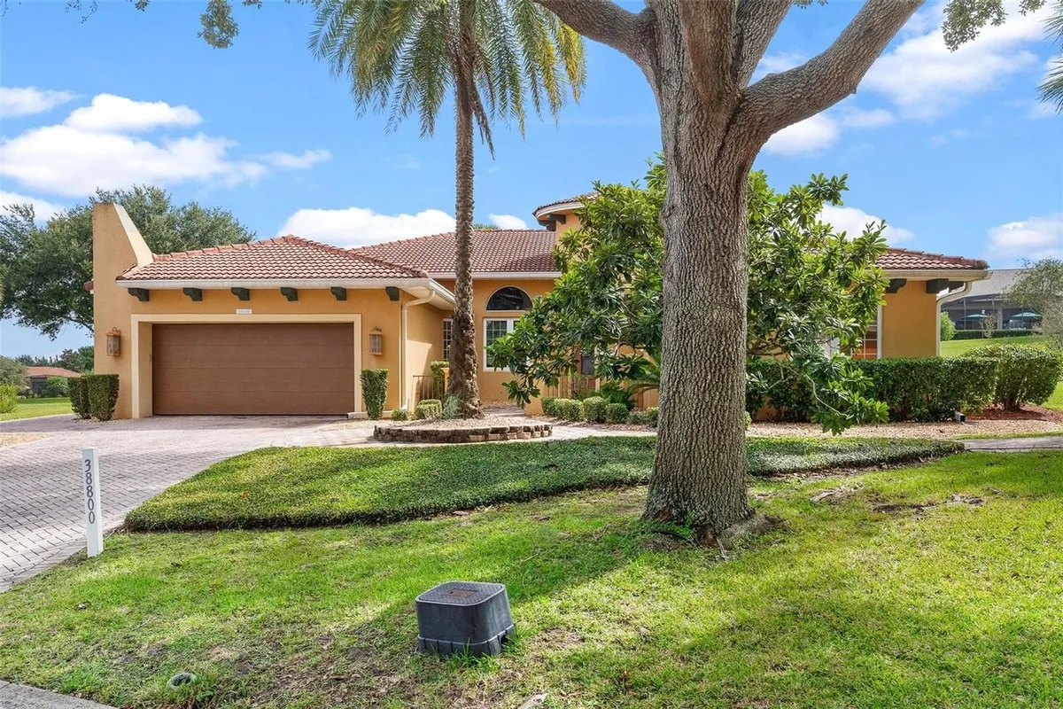 Property Slideshow image 1 of 47 | 38800 harborwoods pl, Lady Lake, FL, 32159