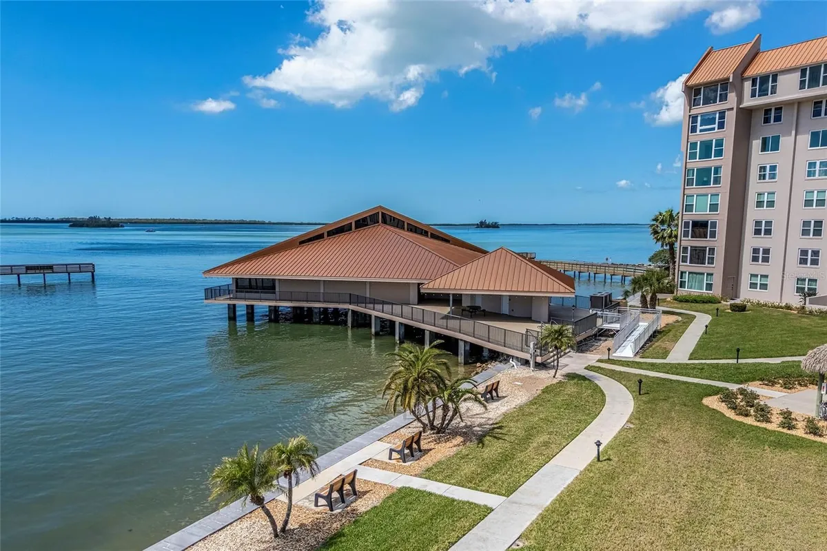 Property Slideshow image 1 of 26 | 620 edgewater drs 103, Dunedin, FL, 34698