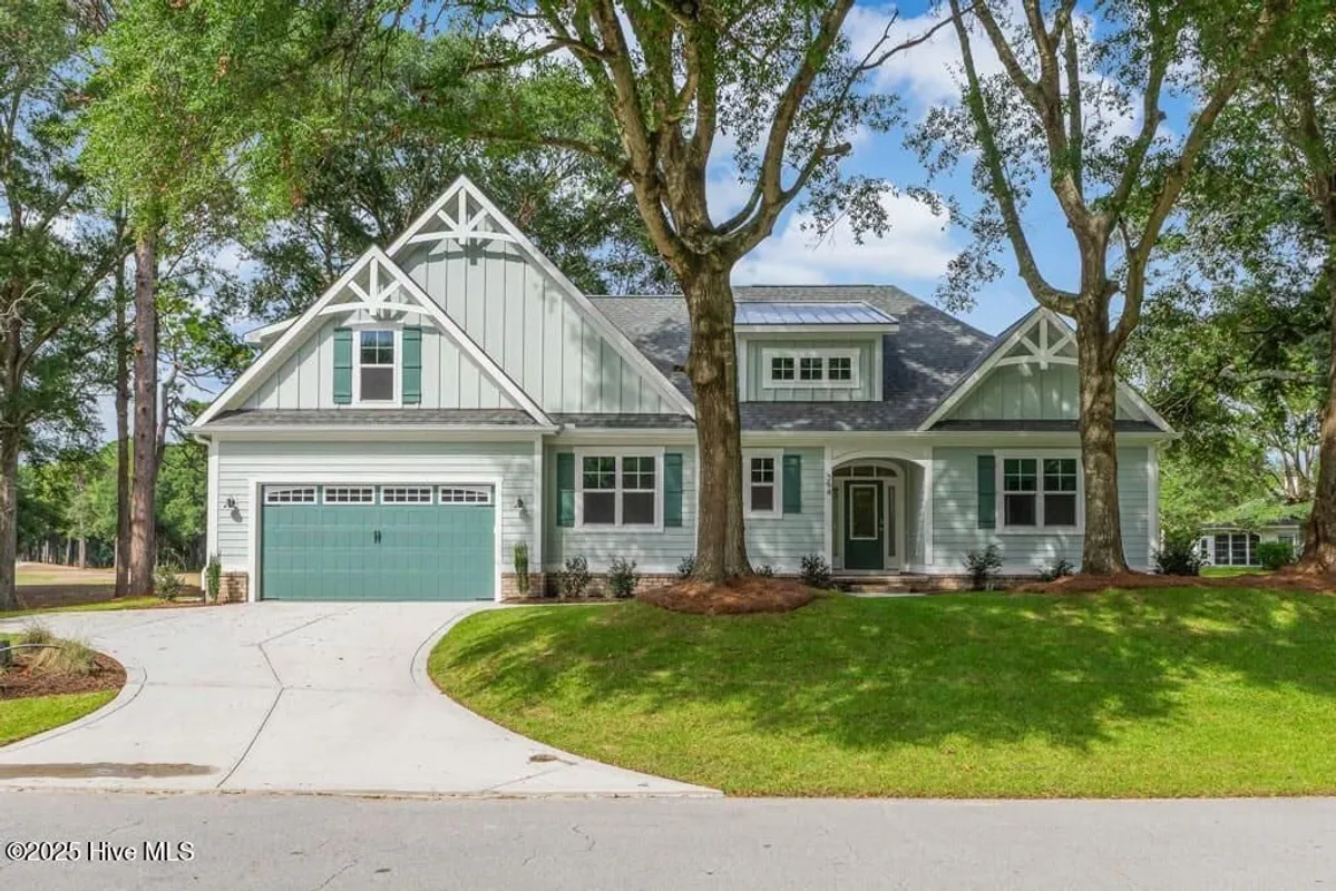 Property Slideshow image 1 of 61 | 394 sea trail dr w, Sunset Beach, NC, 28468