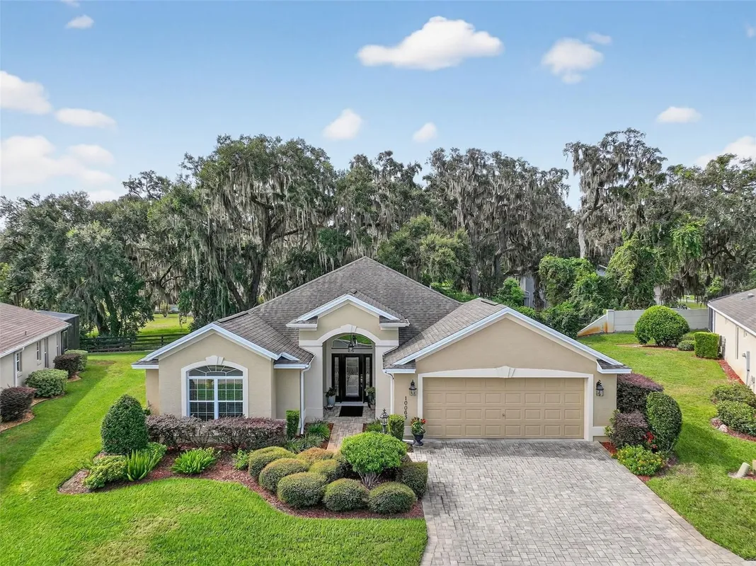 Property Slideshow image 1 of 54 | 10063 lake miona way, Oxford, FL, 34484