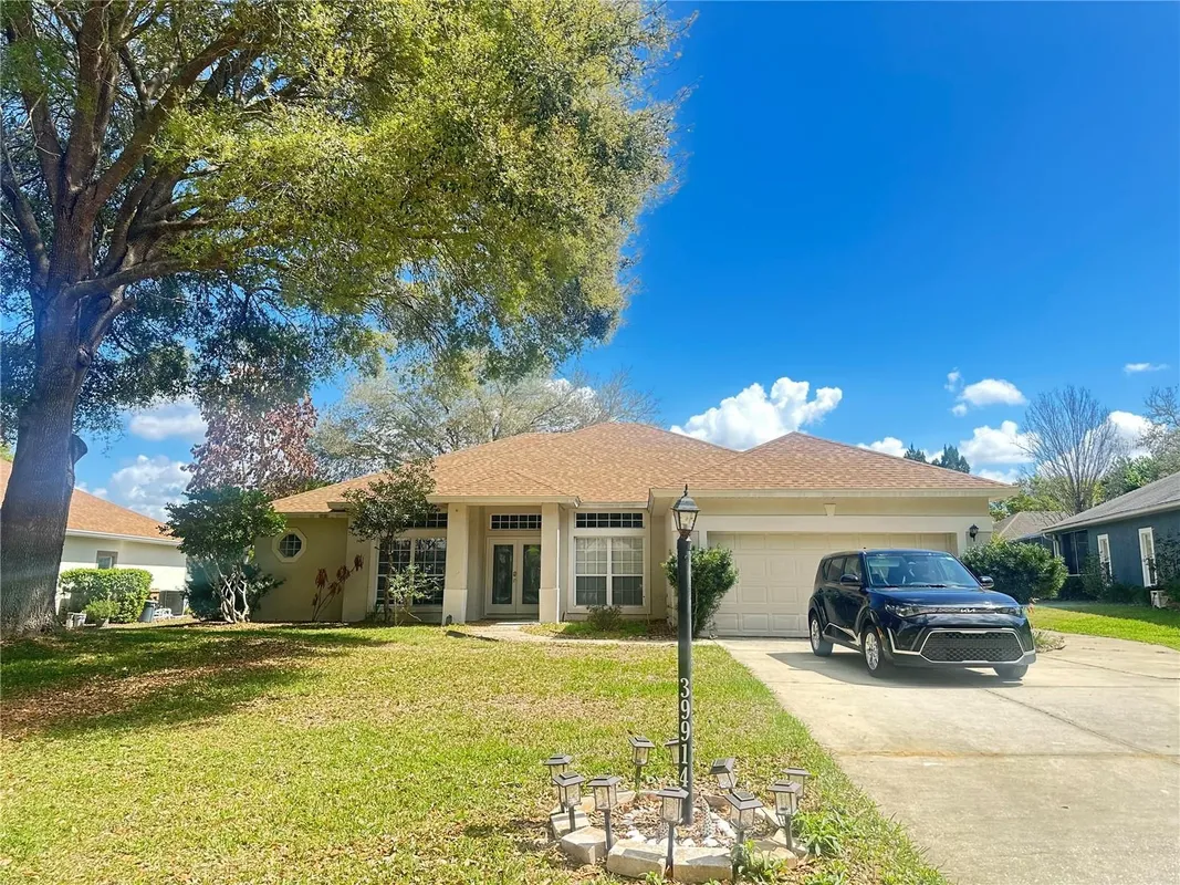 Property Slideshow image 1 of 22 | 39914 sunbeam way, Lady Lake, FL, 32159