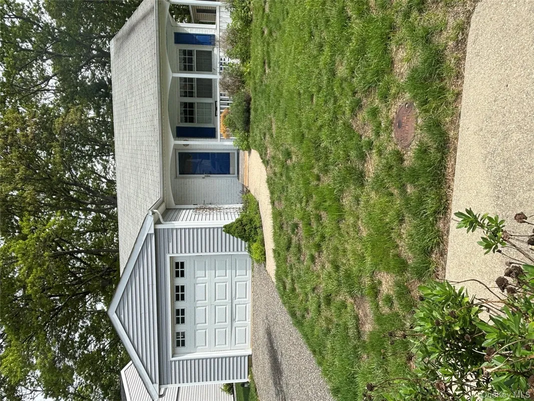 Property Slideshow image 1 of 21 | 190 canterbury dr, Ridge, NY, 11961