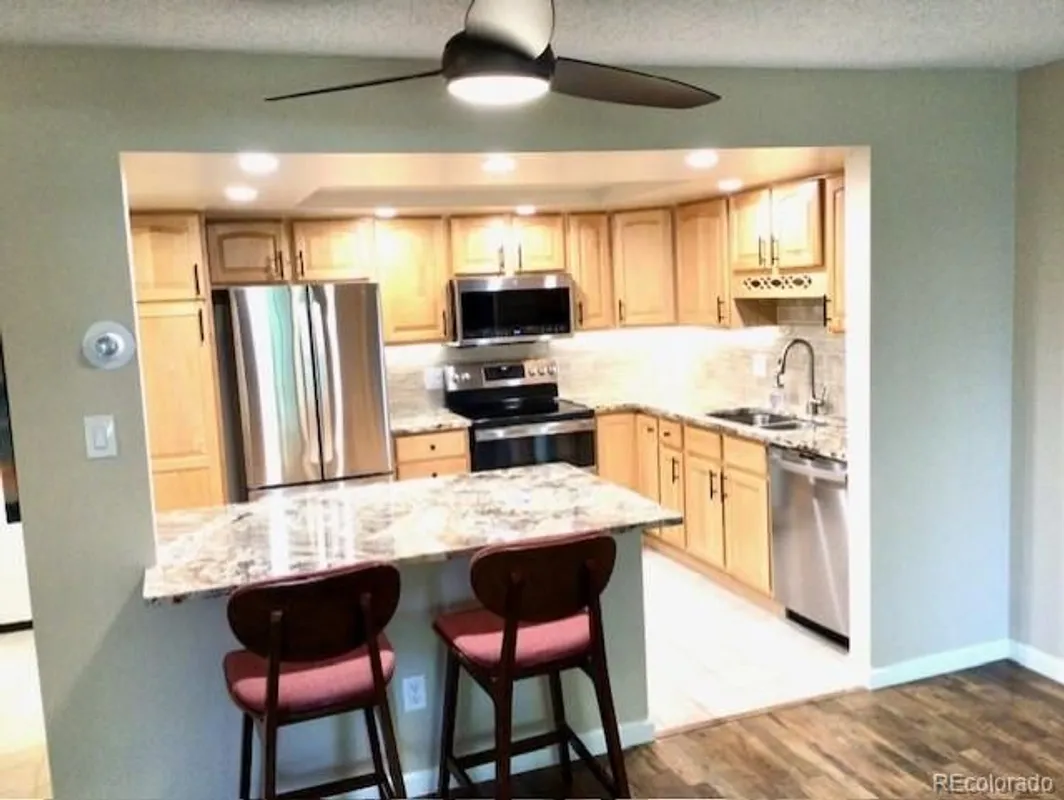 Property Slideshow image 1 of 13 | 13631 e marina dr 111, Aurora, CO, 80014