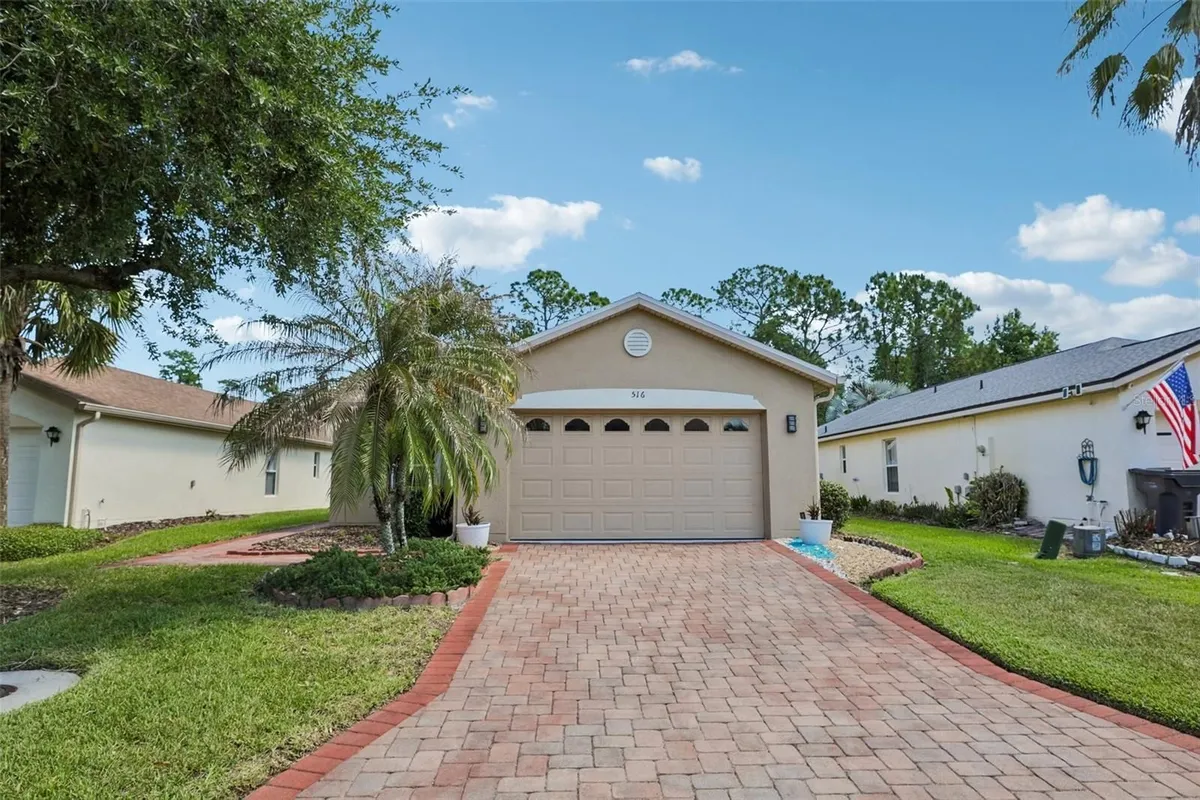 Property Slideshow image 1 of 61 | 516 millifiora ln, Poinciana, FL, 34759
