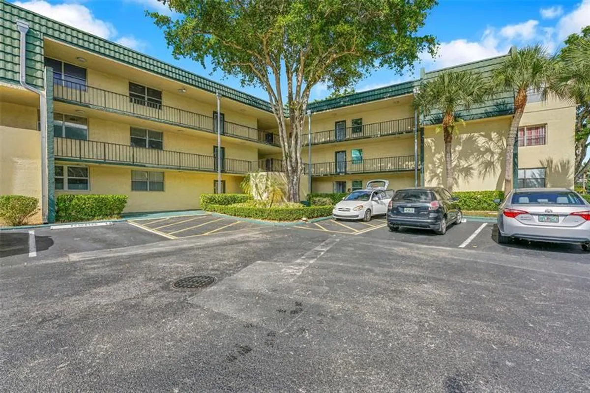 Property Slideshow image 1 of 55 | 9090 lime bay blvd apt 112, Tamarac, FL, 33321