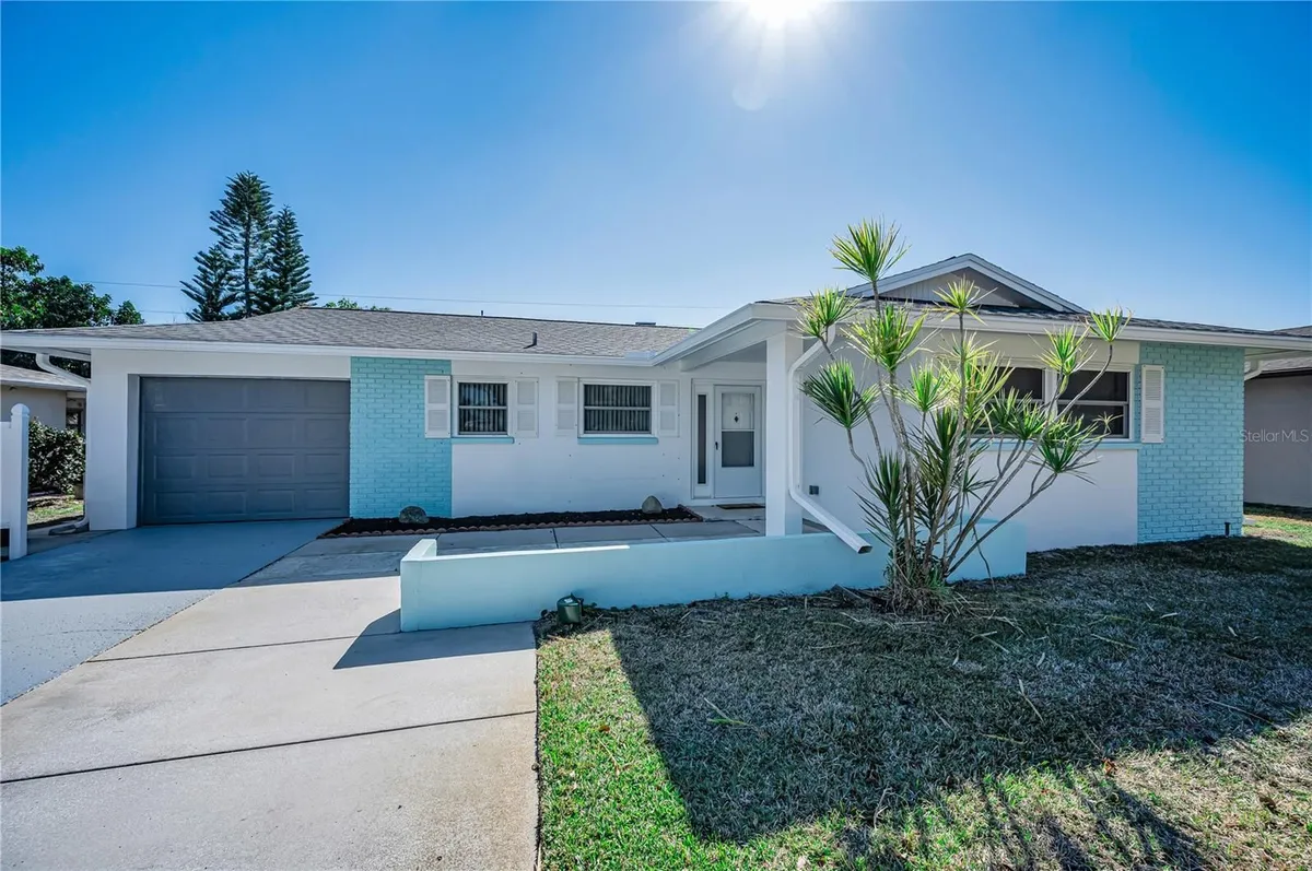 Property Slideshow image 1 of 63 | 128 stafford dr, Palm Harbor, FL, 34684