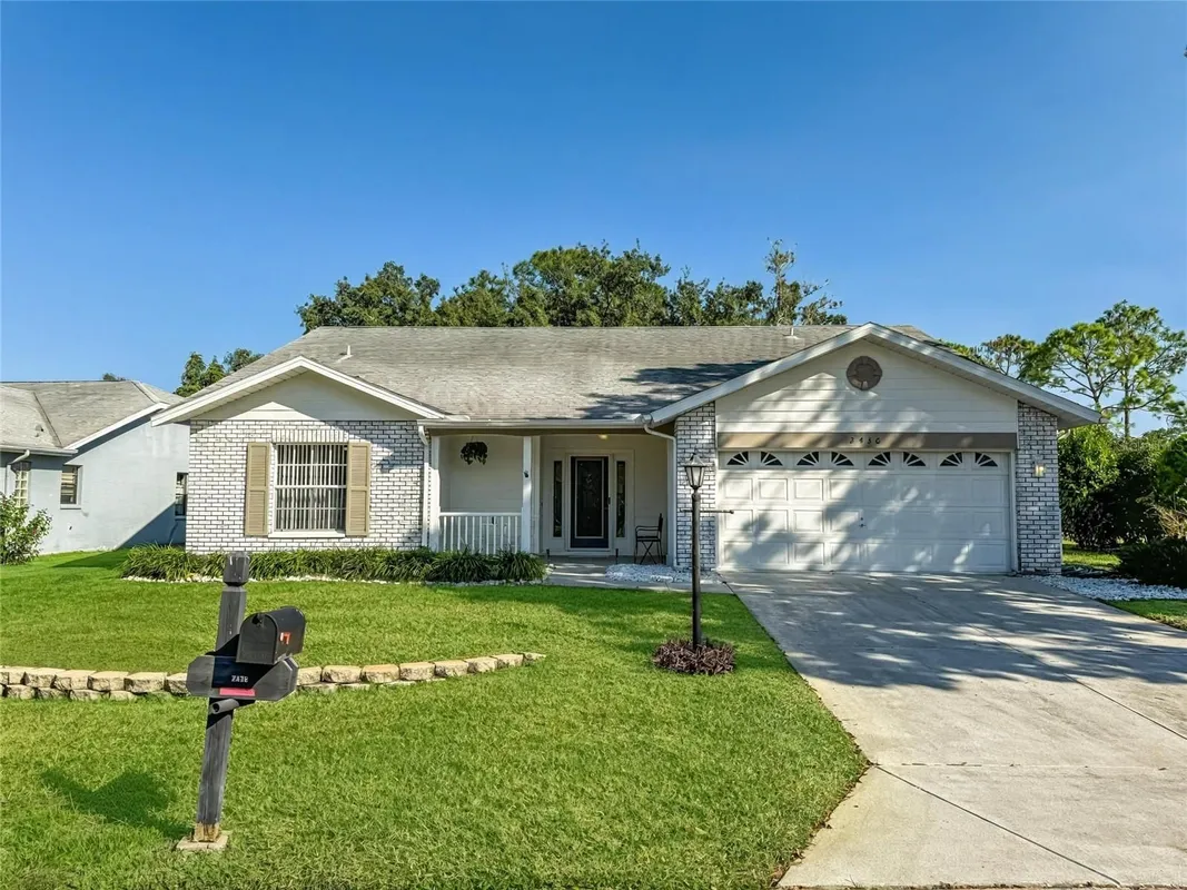 Property Slideshow image 1 of 56 | 2436 deer trail ln, Spring Hill, FL, 34606