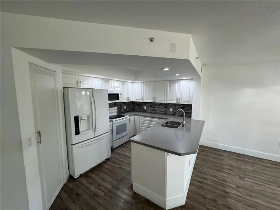 Property Slideshow image 1 of 26 | 1651 sw 127th ave apt 211a, Pembroke Pines, FL, 33027