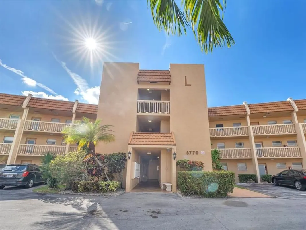 Property Slideshow image 1 of 25 | 6770 royal palm blvd apt 205, Margate, FL, 33063