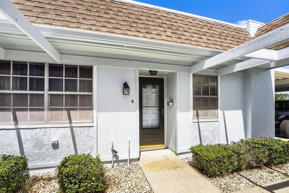 Property Slideshow image 1 of 22 | 11210 carriage hill dr 6, Port Richey, FL, 34668