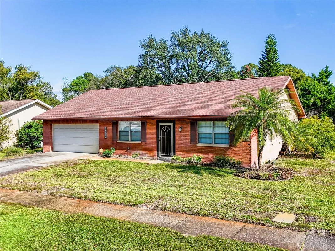 Property Slideshow image 1 of 51 | 1637 caledonia dr, Palm Harbor, FL, 34684