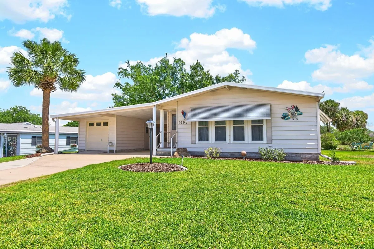 Property Slideshow image 1 of 39 | 1603 cog hill dr, Lady Lake, FL, 32159