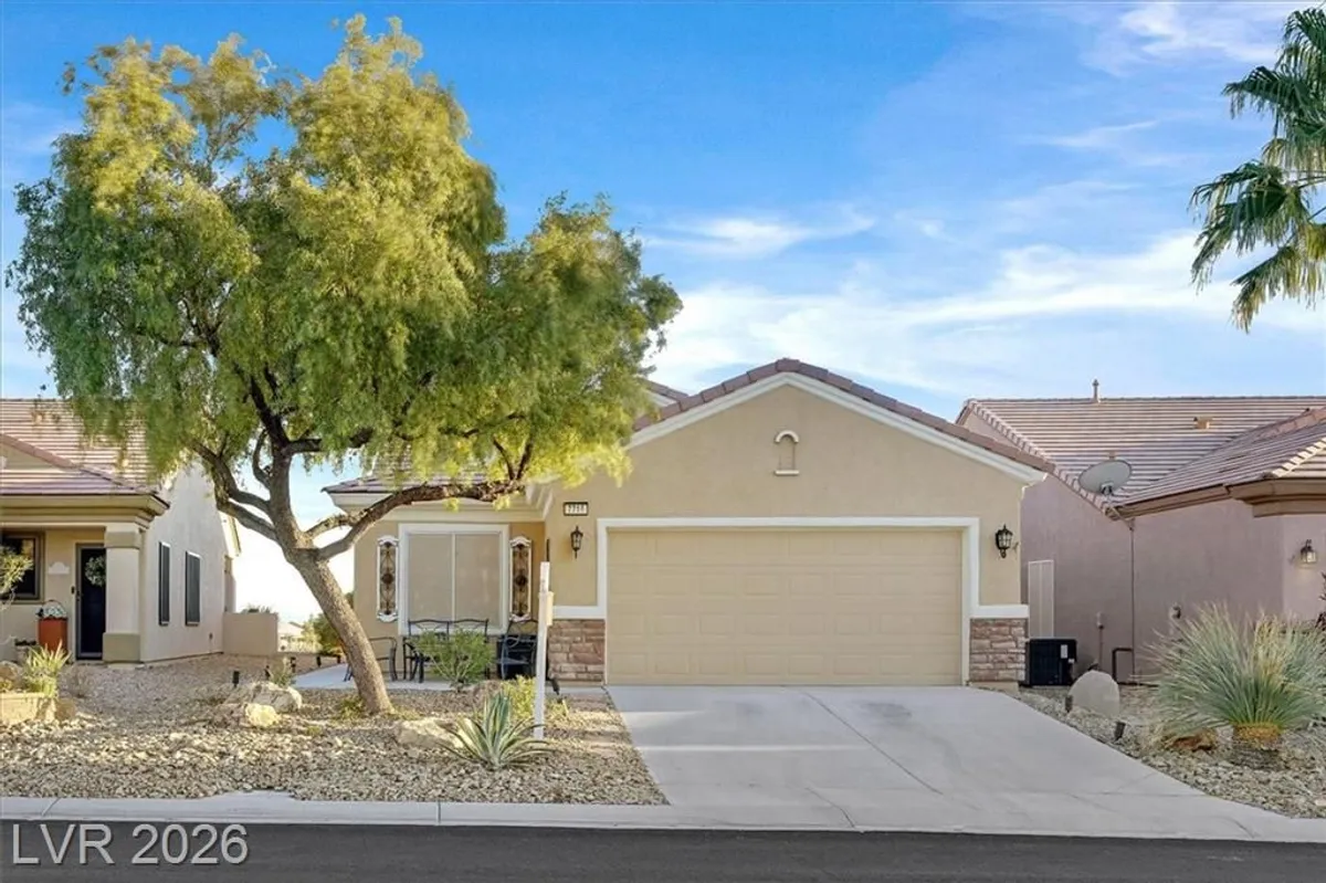 Property Slideshow image 1 of 52 | 7716 pine warbler way, North Las Vegas, NV, 89084