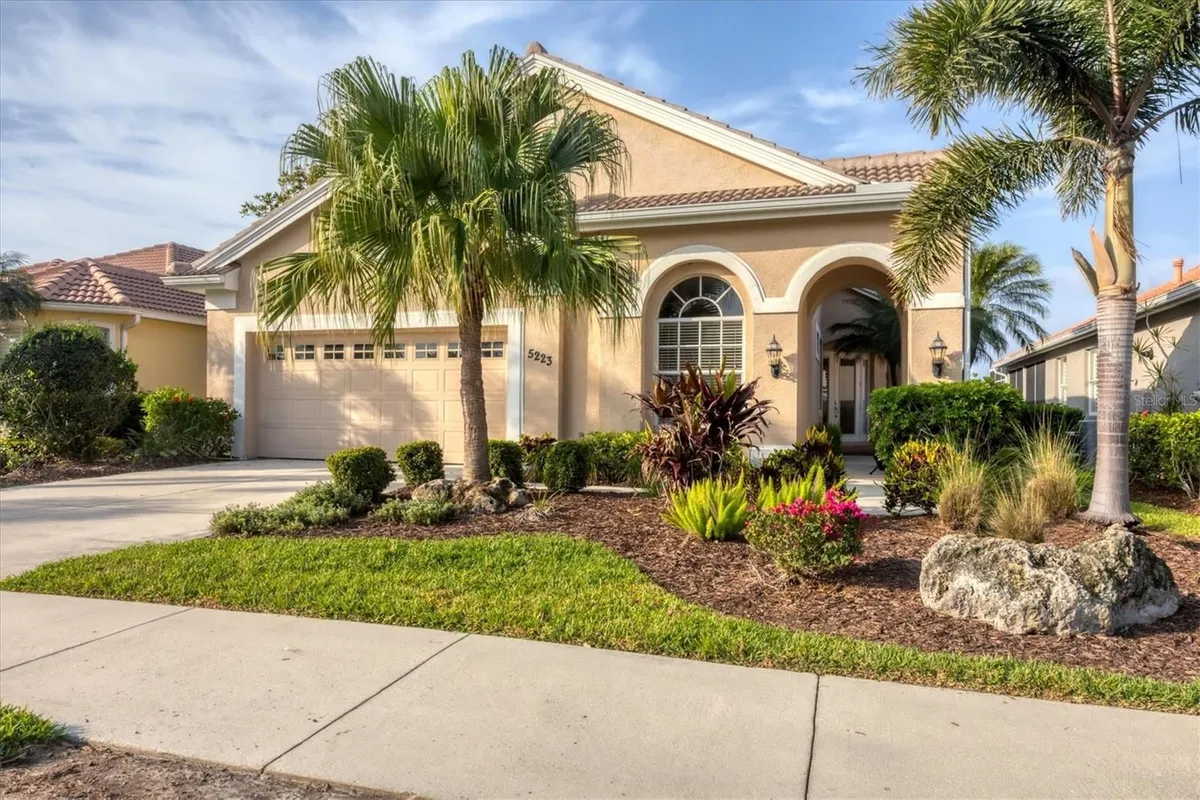 Property Slideshow image 1 of 60 | 5223 pine shadow ln, North Port, FL, 34287